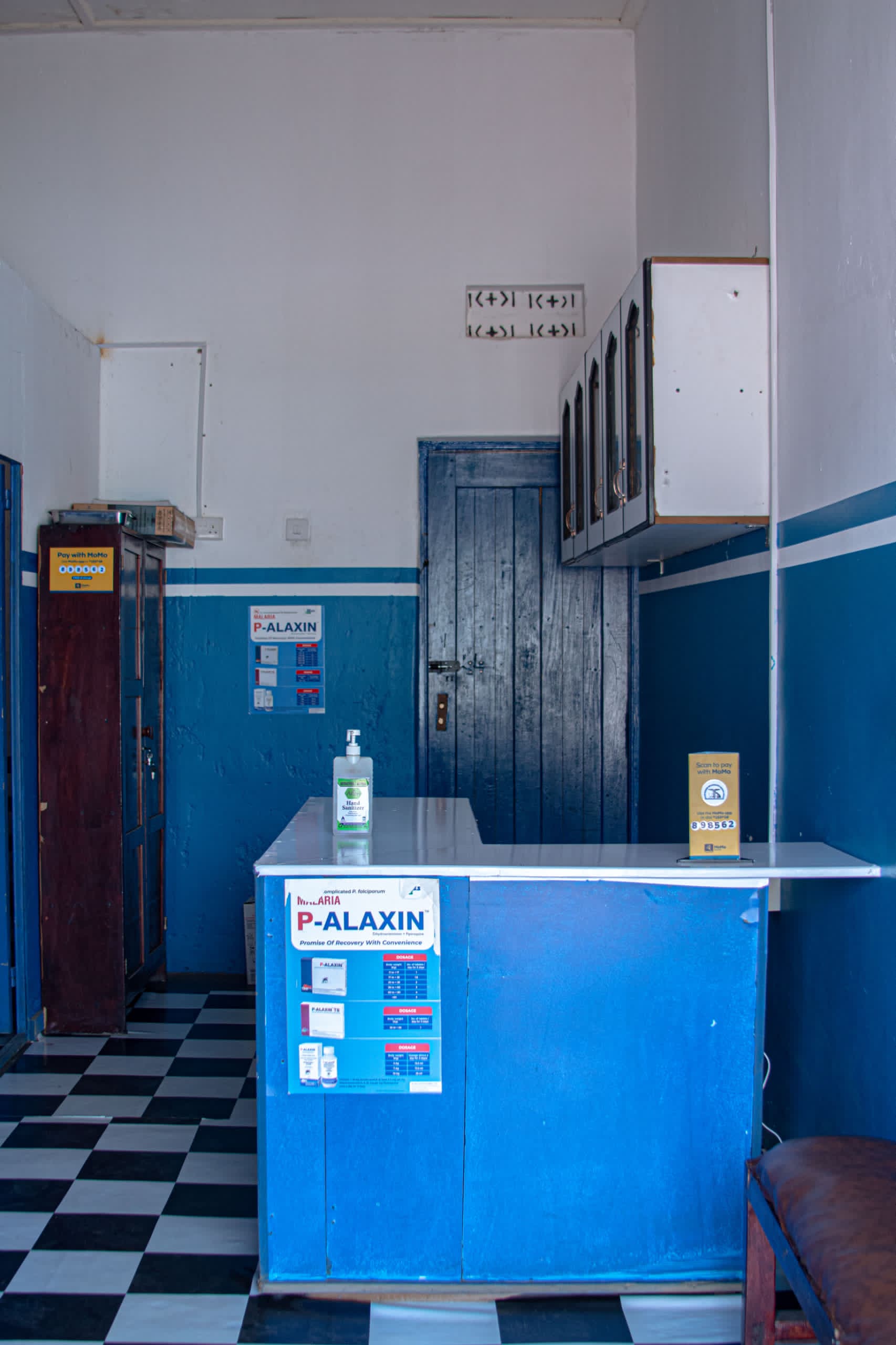 The Mysha reception counter with mobile-money payment sign